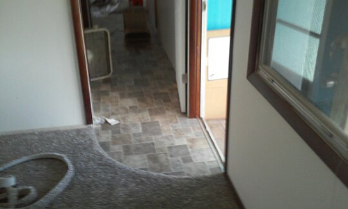 tile carpet entryway